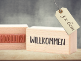 Stempel Willkommen Schriftzug