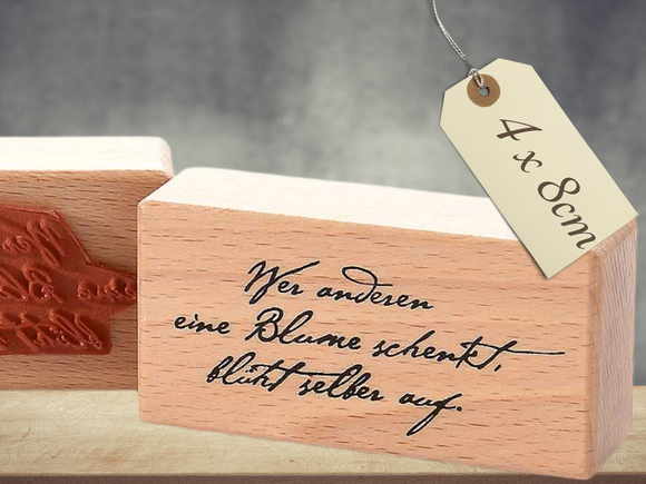 Stempel Wer anderen eine Blume schenkt blüht selber auf Schriftzug